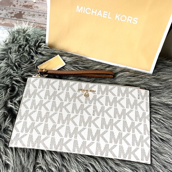 Michael Kors Handbags - NWT Authentic MK signature monogram logo wristlet